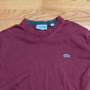 Lacoste sweater size small . Pit to pit 19, shoulder 12, length 25